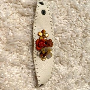 Off white leather, hand sewn flowers, 2 snaps